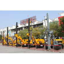 Pneumatic hydraulic crawler rock drill